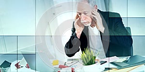 Overworked businessman sitting at a messy desk, geometric pattern