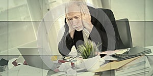 Overworked businessman sitting at a messy desk, geometric pattern