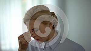 Overworked female manager feeling eye pain, visual impairment, health care