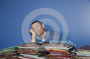 Overworked man at work.