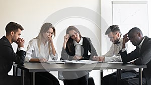 Overworked upset group of diverse people dissatisfied with work results.