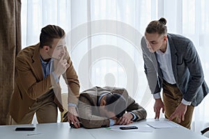 Overworking stress shush quiet tired coworker sleep