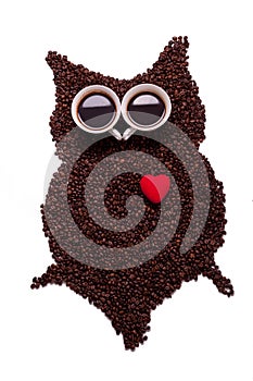 Owl, made of coffee seeds and two caps