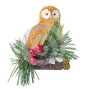 Owl sitting on a branch, red berries,christmas decoration