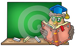 Owl teacher reading book on blackboard