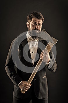 Own opinion. Decision was made. Man brutal hipster with axe. Sharp ax hand confident guy. Masculinity and brutality photo