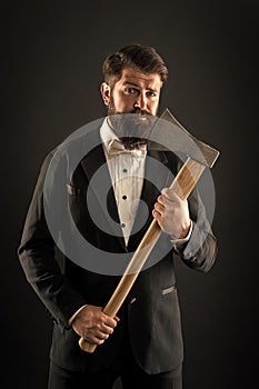 Own opinion. Decision was made. Man brutal hipster with axe. Sharp ax hand confident guy. Masculinity and brutality photo