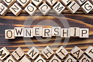ownership wooden cubes with letters