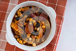 Ox tripe in tomato sauce with chick peas and olives also known as callos