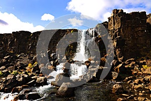 Oxararfoss - the waterfall of Oxara river. Late summer landscape in Thingvellir National Park.