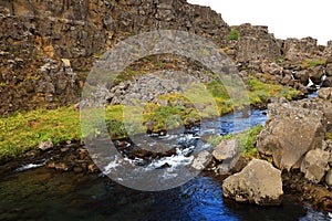 Oxararfoss - the waterfall of Oxara river. Late summer landscape in Thingvellir National Park.
