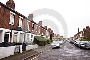 OXFORD/ UK- OCTOBER 26 2016: Exterior Of Victorian Terraced Houses In Oxford With Parked Cars