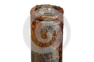 Oxidized old battery isolated on a white background. Close up