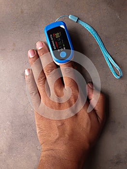 Oximeter to measure oxygen saturation in body.