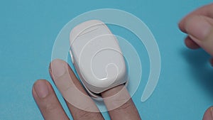 Oximeter usage. Finger pulse oximeter used to measure pulse rate and oxygen levels