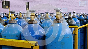 Oxygen cylinder with compressed gas. Blue Oxygen tanks for industry. Liquefied oxygen production. Factory