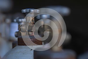 oxygen cylinder valve on dark background