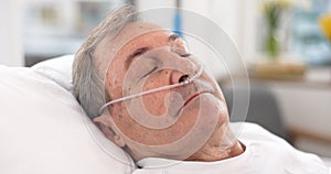 Oxygen, hospital bed and senior man sleeping with ventilation and breathing tube support in a clinic. Elderly patient