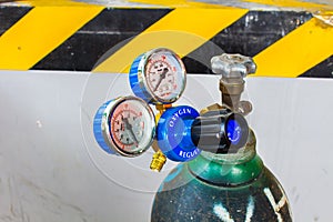 The Oxygen valve and pressure gage on tank.