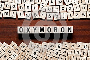 Oxymoron word concept on cubes