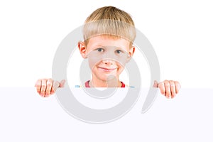 Oy 5-6 years old holding blank poster