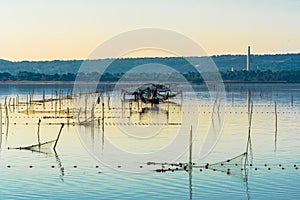 Oyster and fishing farming area of Ayrolle Pond in Narbonaise Mediterranean National Park.  Occitanie, France