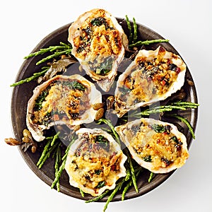 Oysters with Cheesy Gratin Topping Served on Plate