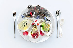 Oysters poached and served with lemon foam and caviar. The other smoked and served with ponzu granite.