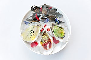 Oysters poached and served with lemon foam and caviar. The other smoked and served with ponzu granite.