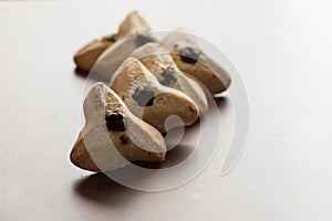 Ozney haman Haman Ear Triangular pastry made of crispy dough stuffed.