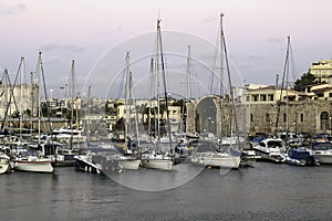 Ð¡ozy Marina in the heart of Heraklion on the background of historical buildings background