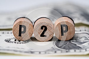 P2p Word On Wooden Blocks Over Dollar Bill