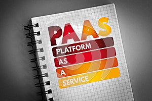 PAAS - Platform as a service acronym on notepad, technology concept background photo