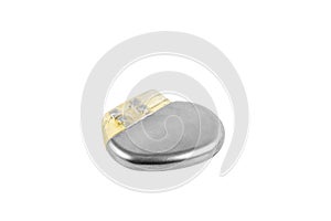 Pacemaker isolated on a white background. Heart battery. Close-up of cardiac pacemaker on electrocardiography. High angle view of