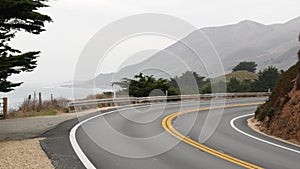 Pacific coast highway 1, Cabrillo road along ocean, foggy California Big Sur USA