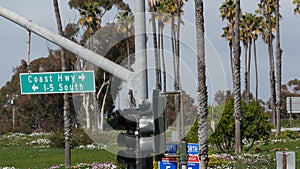 Pacific Coast Highway, historic route 101 road sign, tourist destination in California USA. Lettering on intersection signpost.