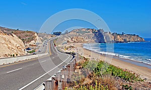 Pacific Coast Highway passing by the El Moro Campground and Crystal Cove Region.