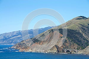 Pacific Coast Highway shoreline with bridge