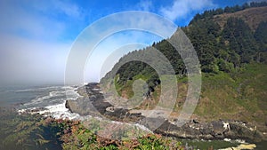 The Pacific Coast in Oregon, USA. Big waves roll ashore.