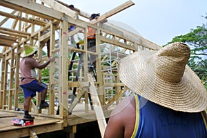 Pacific island builders building a new home in Rarotonga Cook Is photo