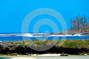 Pacific island coast with blue sky, Vanuatu