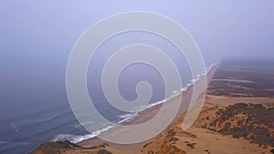 Pacific ocean coastline aerial view from above.