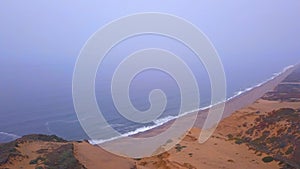 Pacific ocean coastline aerial view from above.