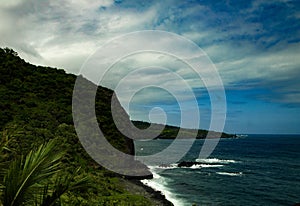 Pacific ocean and dark clouds as seen from road to Hana Hawaii