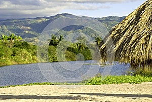 Pacific Ocean estuary with Sierra Madre mountains