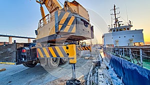 The Pacific ocean and The Port Are Covered with Ice. Handling Equipment Waiting for The Opportunity to Start Work