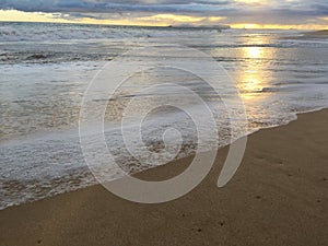 Pacific Ocean Waves at Beach in Kekaha during Sunset on Kauai Island, Hawaii.