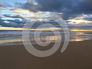 Pacific Ocean Waves at Beach in Kekaha during Sunset on Kauai Island, Hawaii.