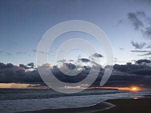 Pacific Ocean Waves at Beach in Kekaha during Sunset on Kauai Island, Hawaii.