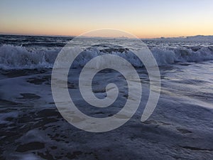 Pacific Ocean Waves at Beach in Kekaha during Sunset on Kauai Island, Hawaii.